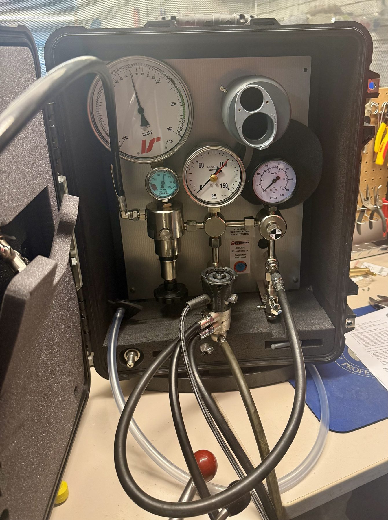 Interspiro Spiromatic Test bench with gauges and an Interspiro regulator connected for testing