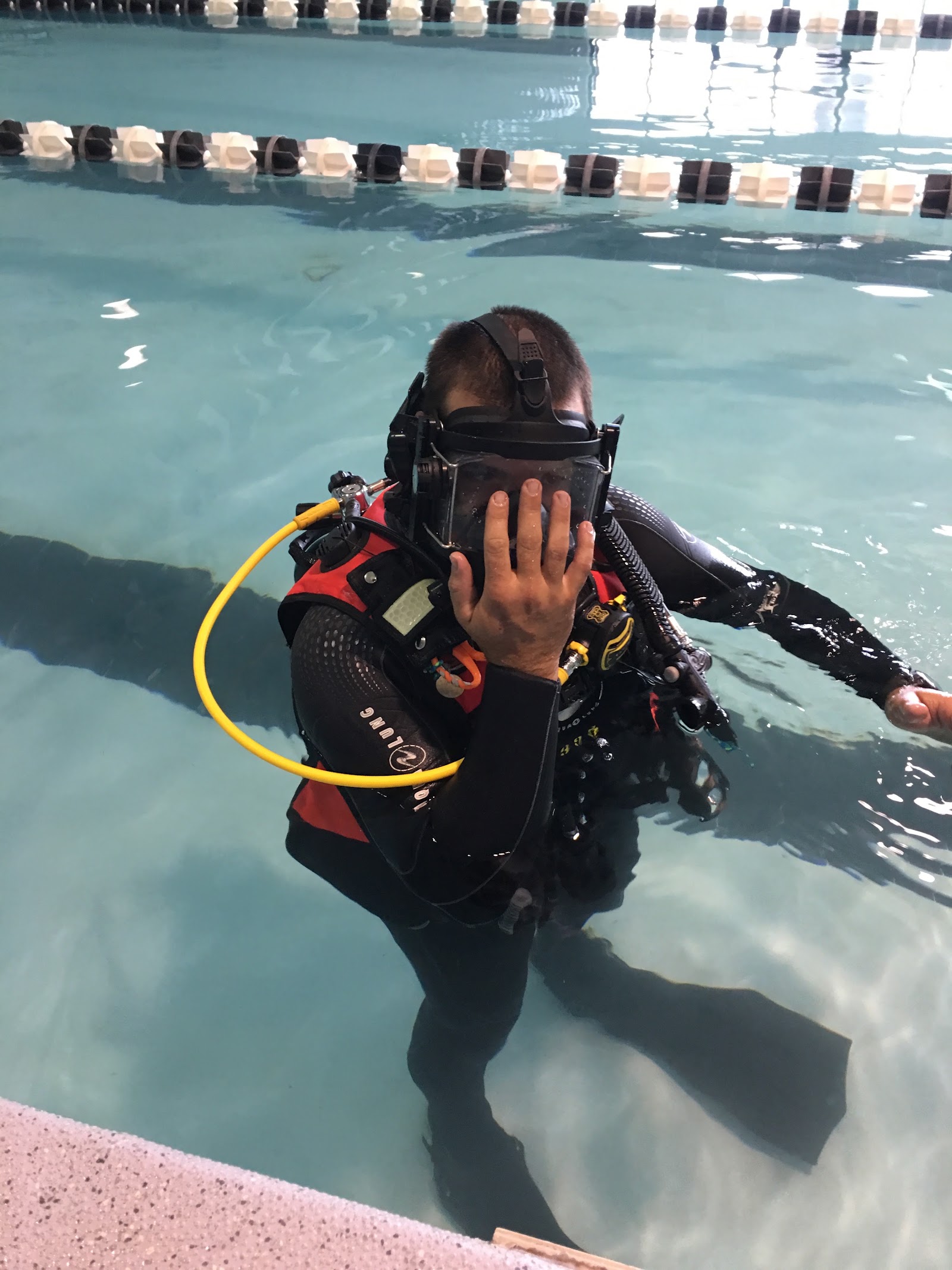 Open water scuba student, Gastonia NC Scuba student in the pool during an open water certification class at Sink or Swim Scuba in Gastonia, NC