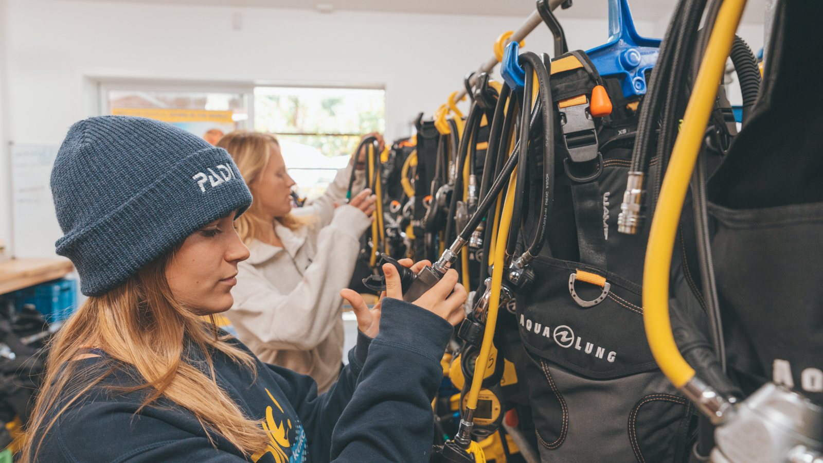 Scuba equipment prepared on a gear rack